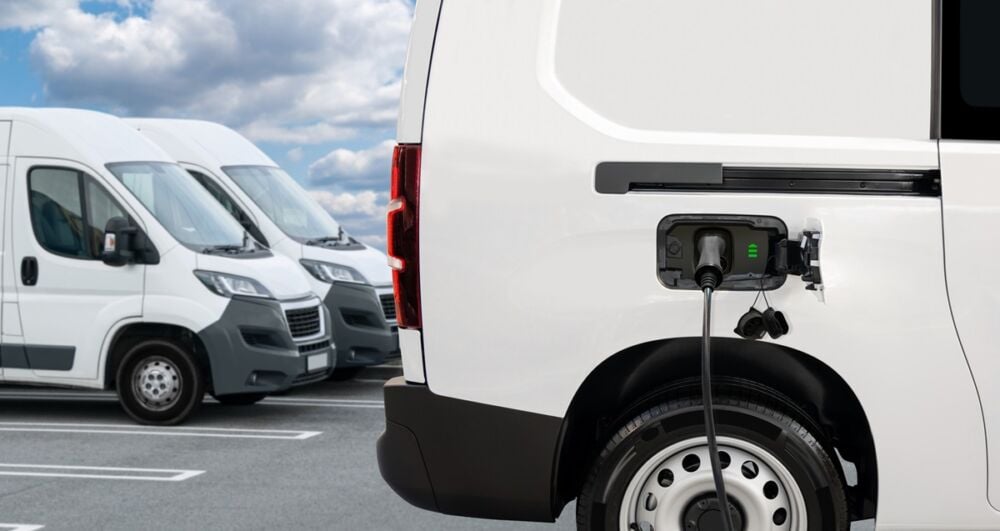 Electric delivery vans with electric vehicles charging station.
